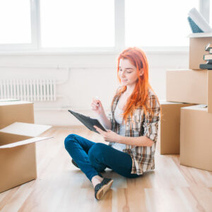 Person completing an apartment rental checklist