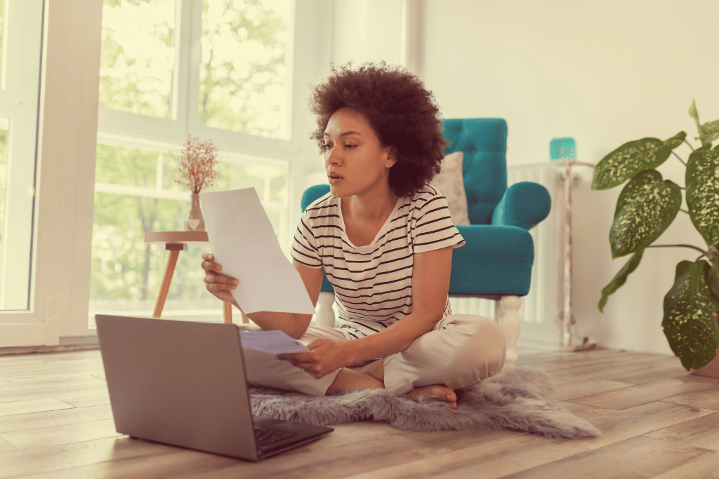 woman reviewing her student loans and making a payment online