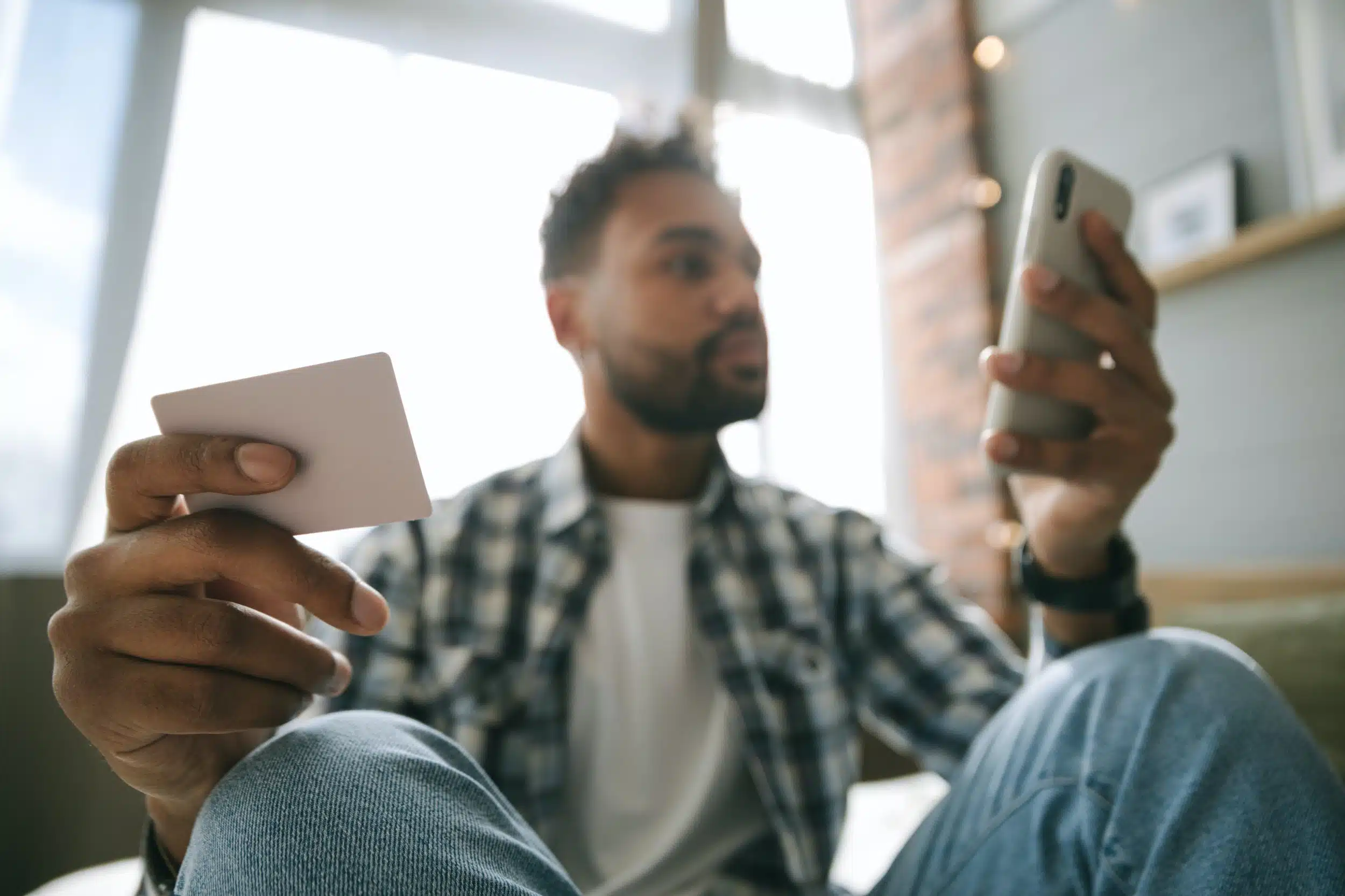 A person checking the available balance on a credit card