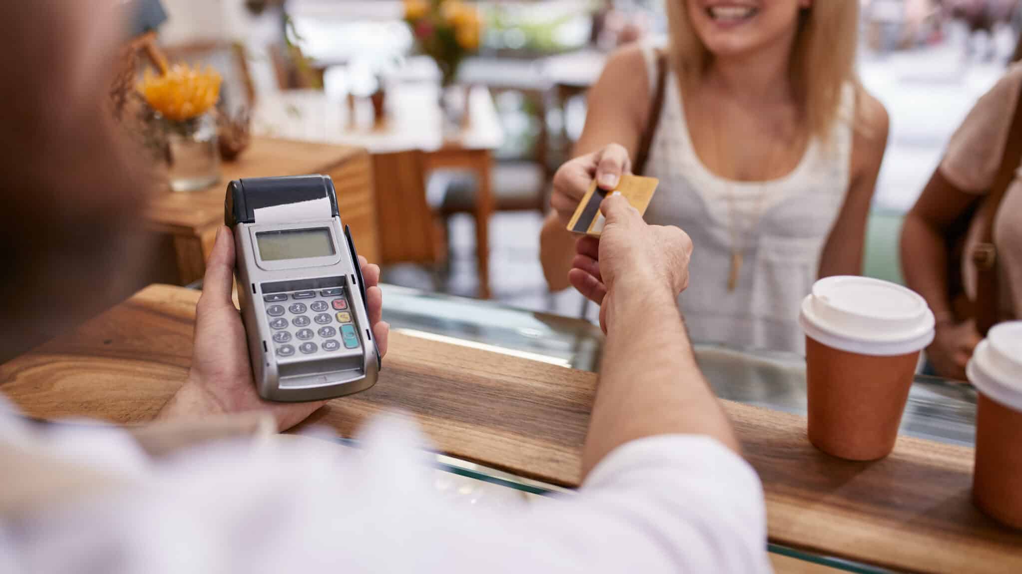customer shopping at coffee shop with credit card