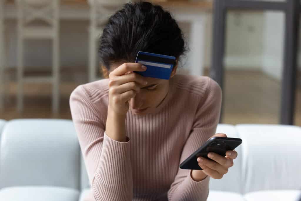 frustrated woman upset about credit card debt