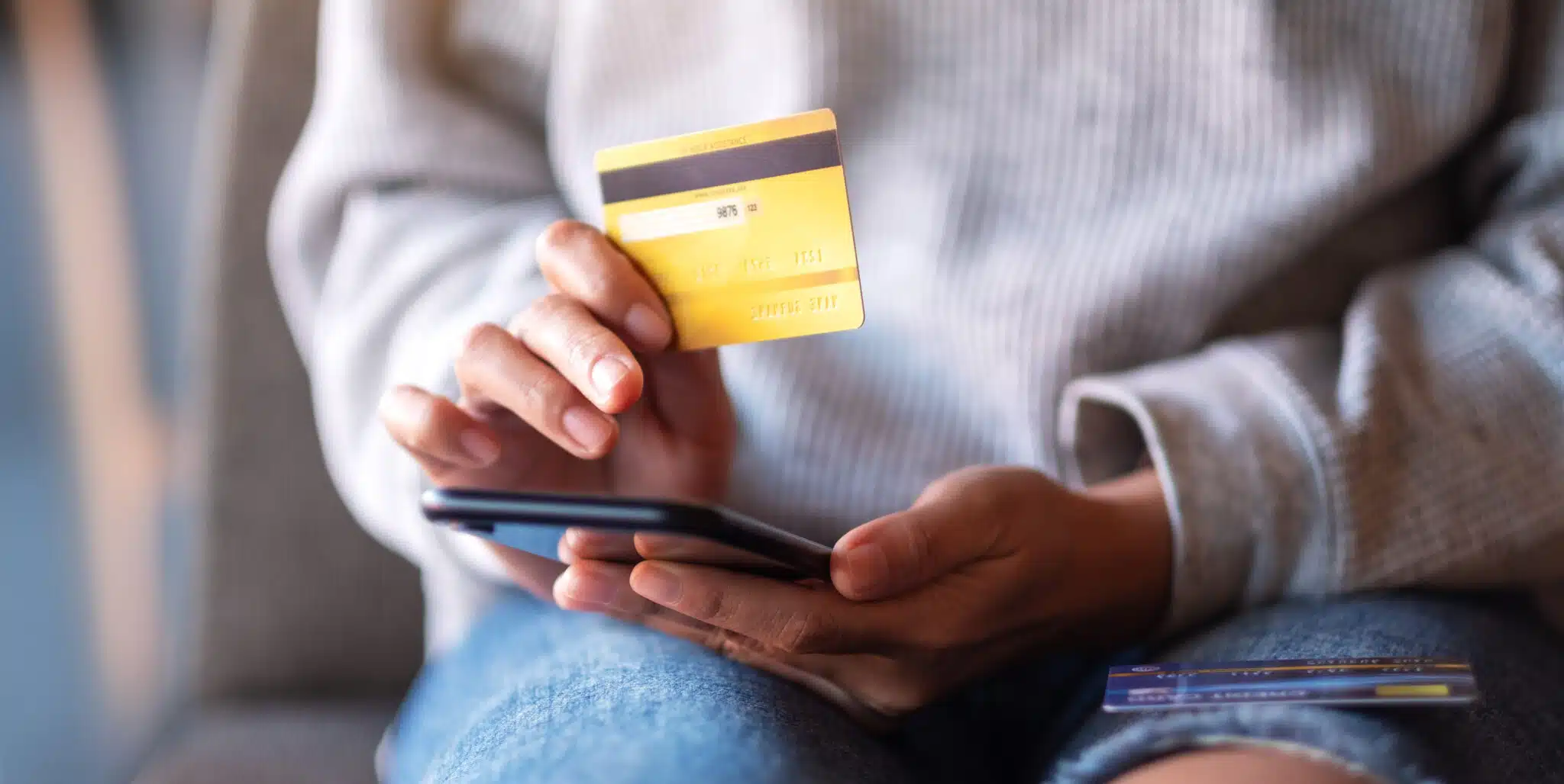 A person making a mobile payment with a credit card