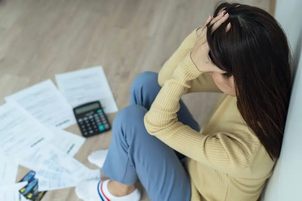 Worried person researching loan alternatives on their phone