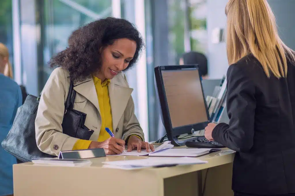 Woman switching banks online and feeling relieved