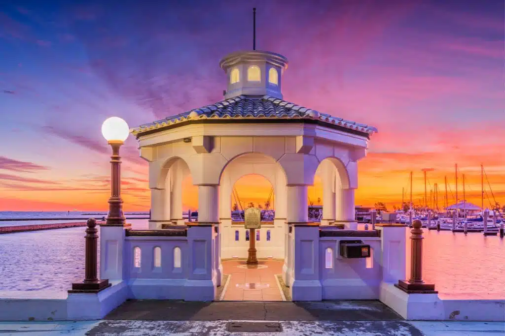 Corpus Christi seawall entrance lit up at night along the Texas coast