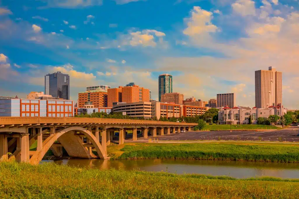 Daytime skyline view of Fort Worth, Texas with a bridge in the foreground