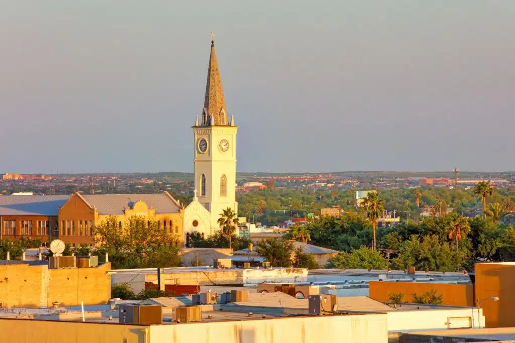 Clocktower landmark with Laredo, Texas city sprawl in the background