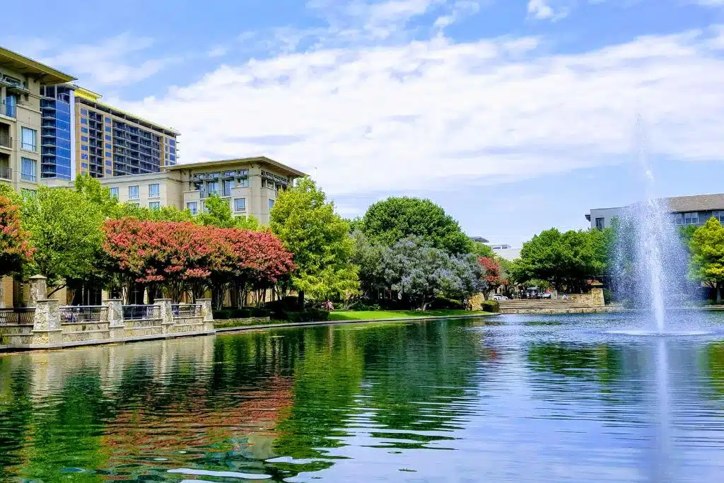 Plano, Texas skyline with water in the foreground on a clear day