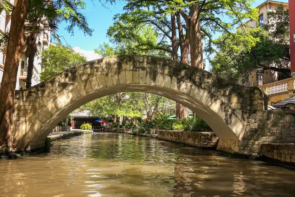 Daytime view of a bridge along the San Antonio River Walk